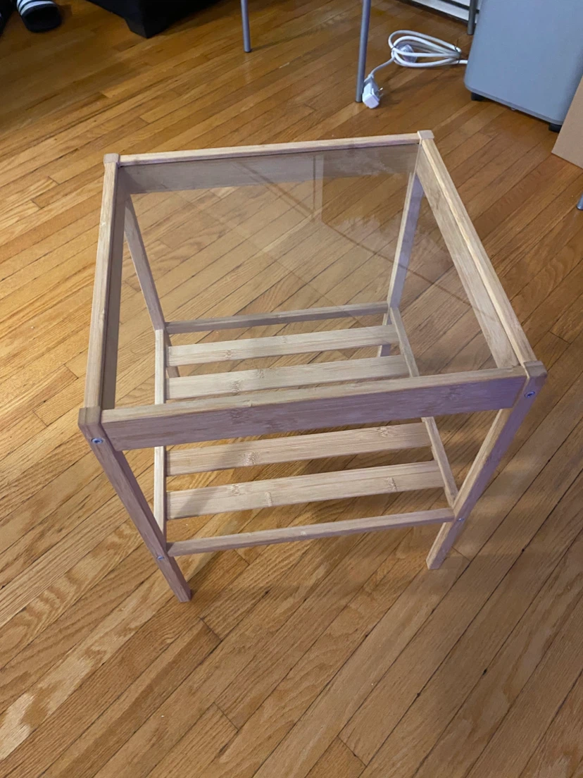 Bamboo side table with glass top