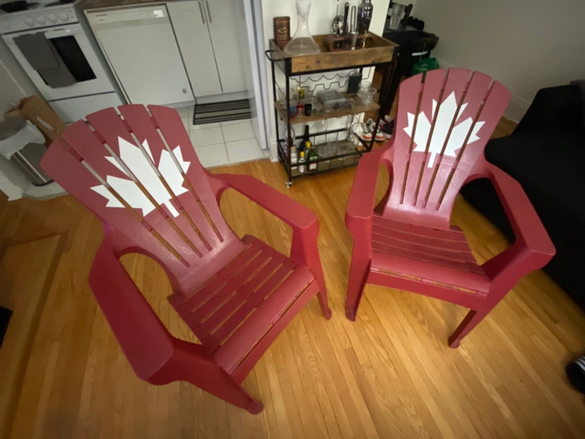 Set of 2 Red Muskoka Chairs with Maple Leaf Design