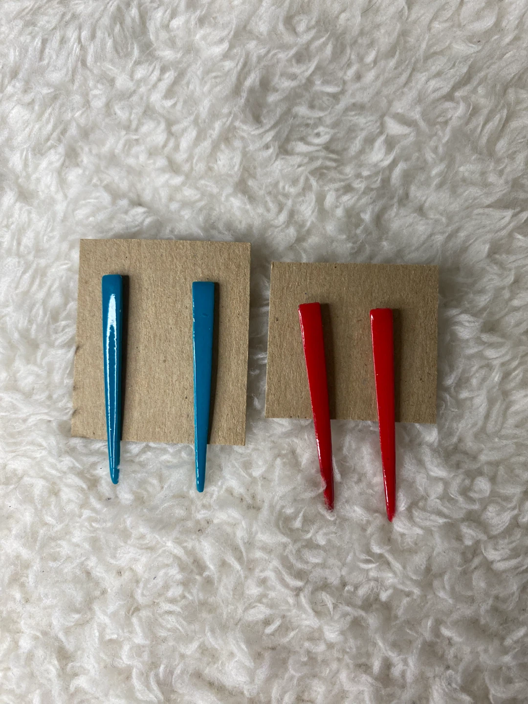 Two pairs of spike earrings