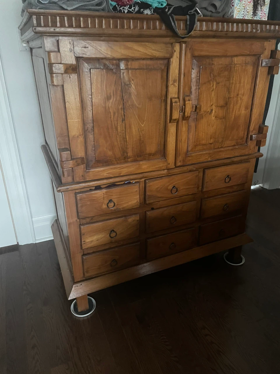 Rustic Teak armoire. Pick up upstairs bedroom