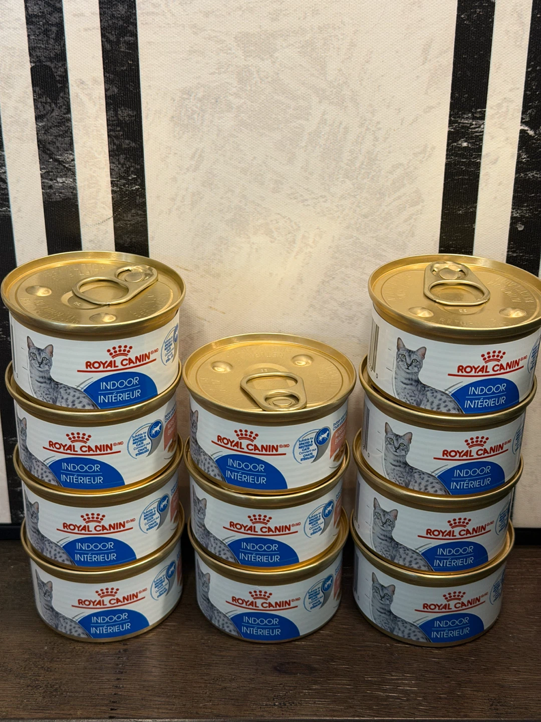 Cans of Royal Canin Indoor Adult Cat Food