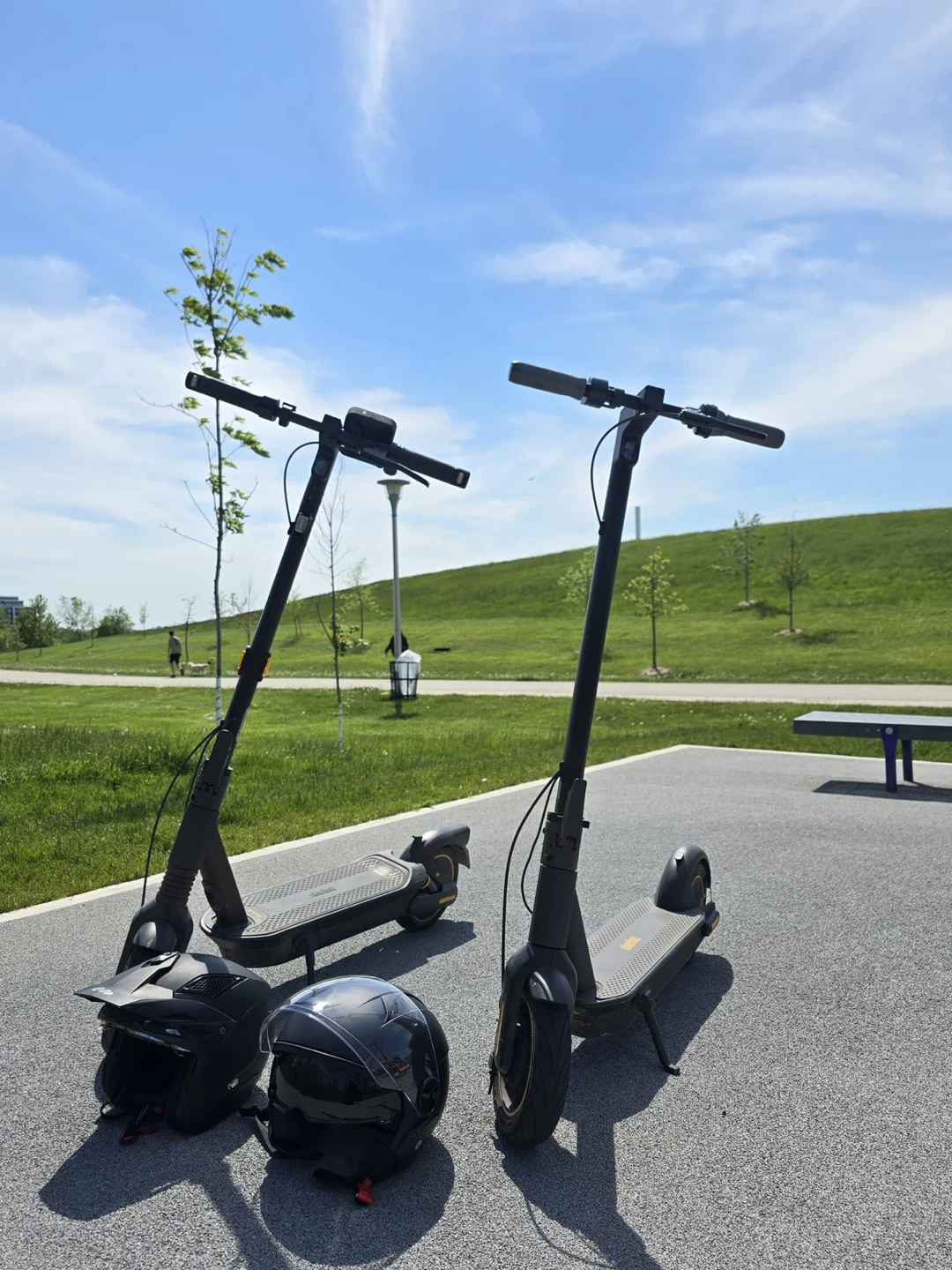 Two Ninebot Segway Electric Scooters with Helmets