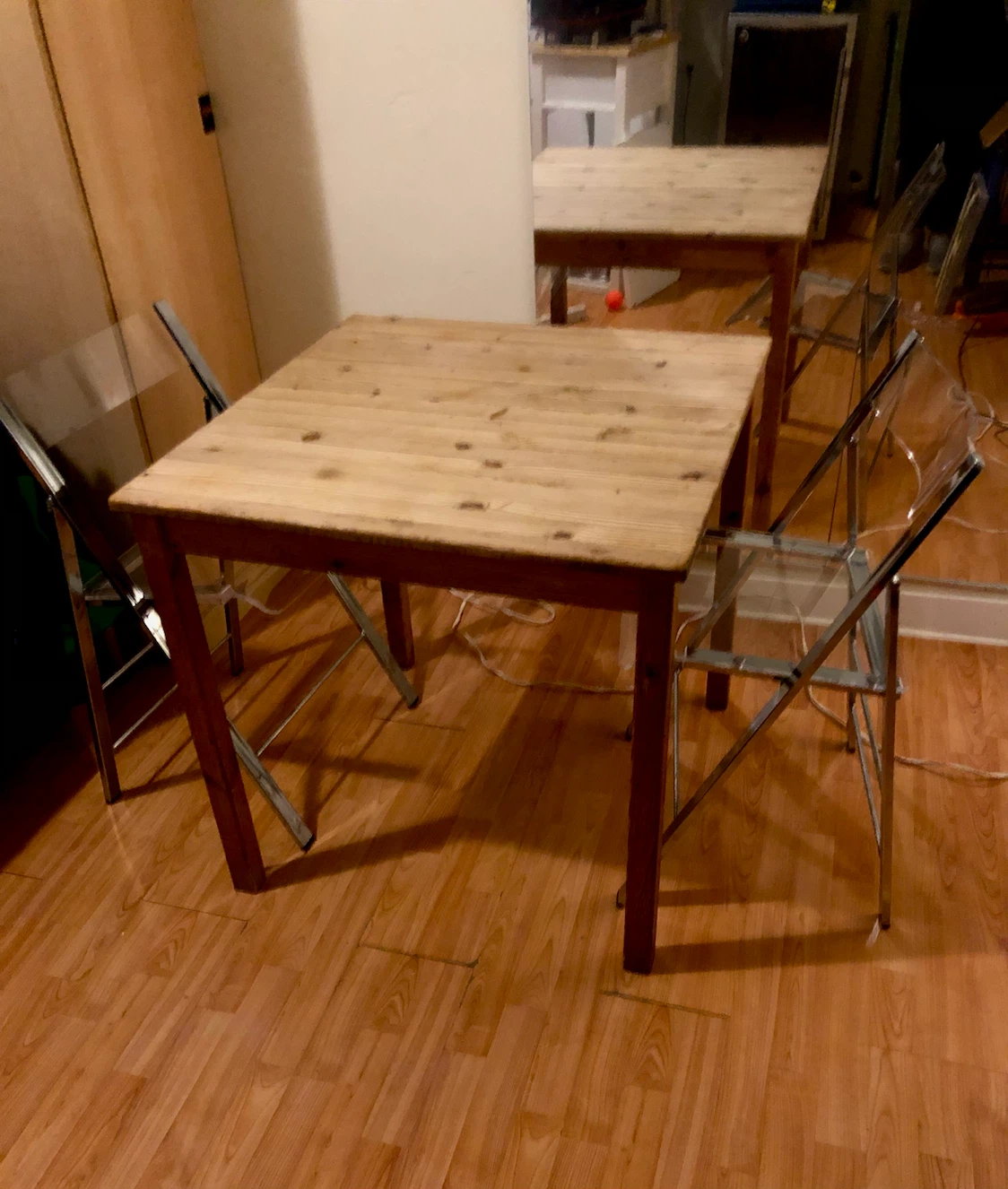 IKEA  Table With Two Clear Acrylic Folding Chairs