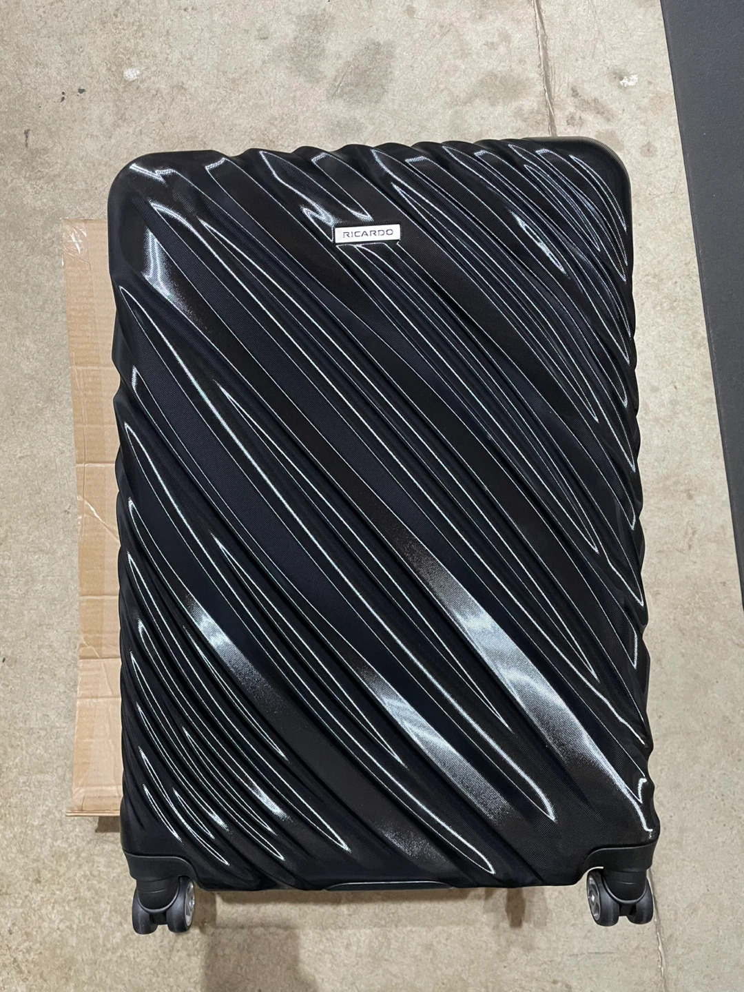 Brand New Ricardo Luggage/Suitcase