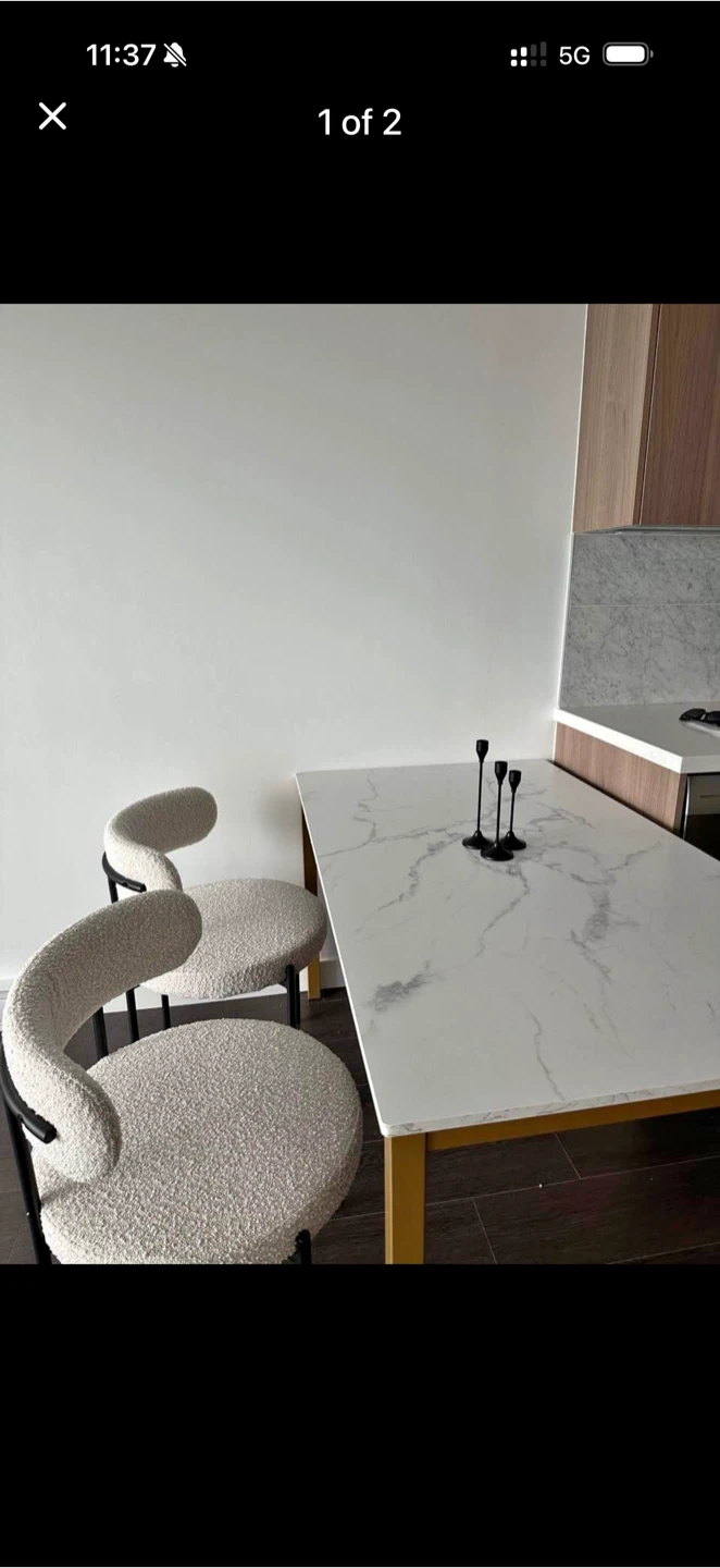 Marble-look dining table with gold legs