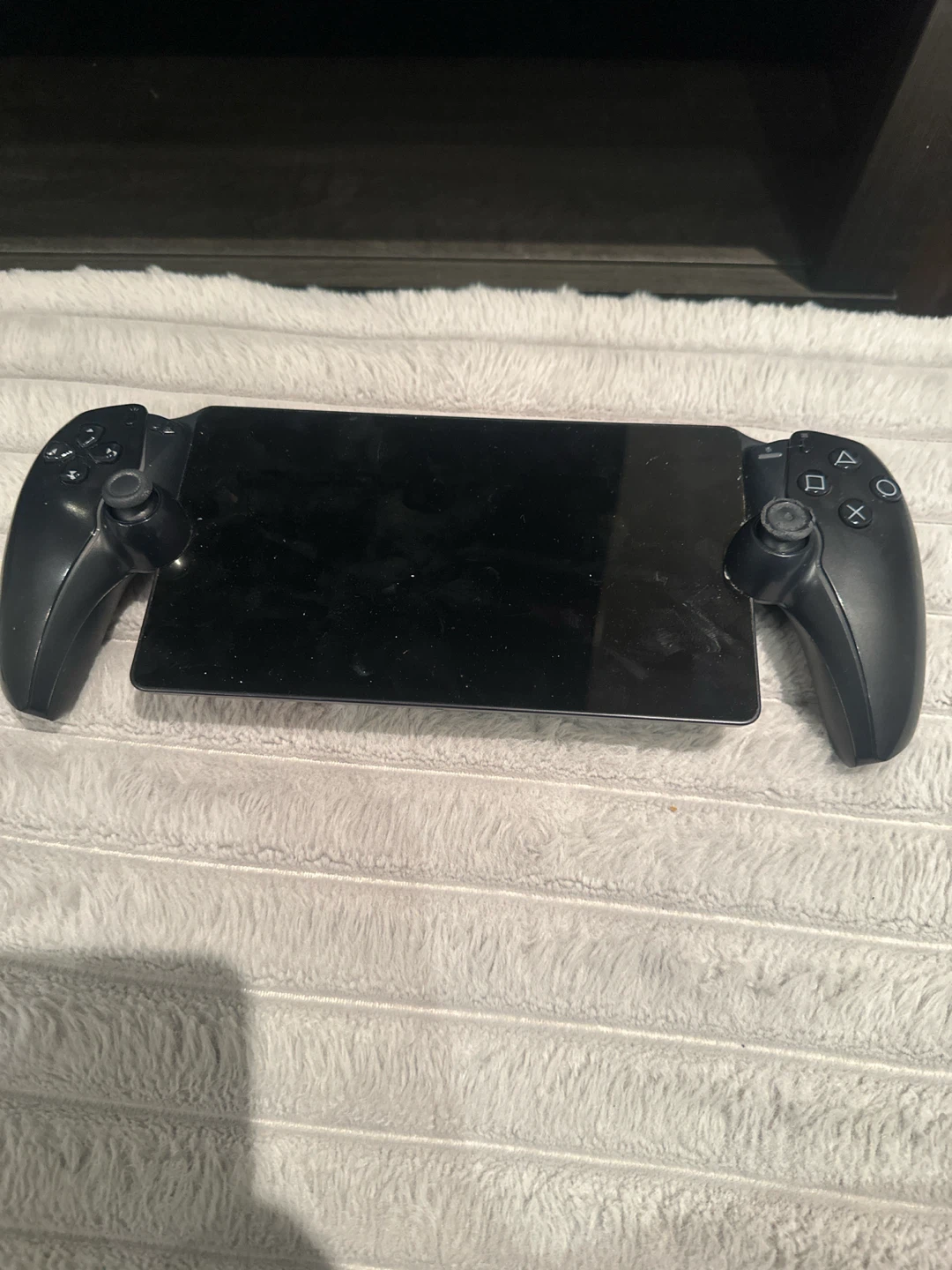 A black Play Station portal