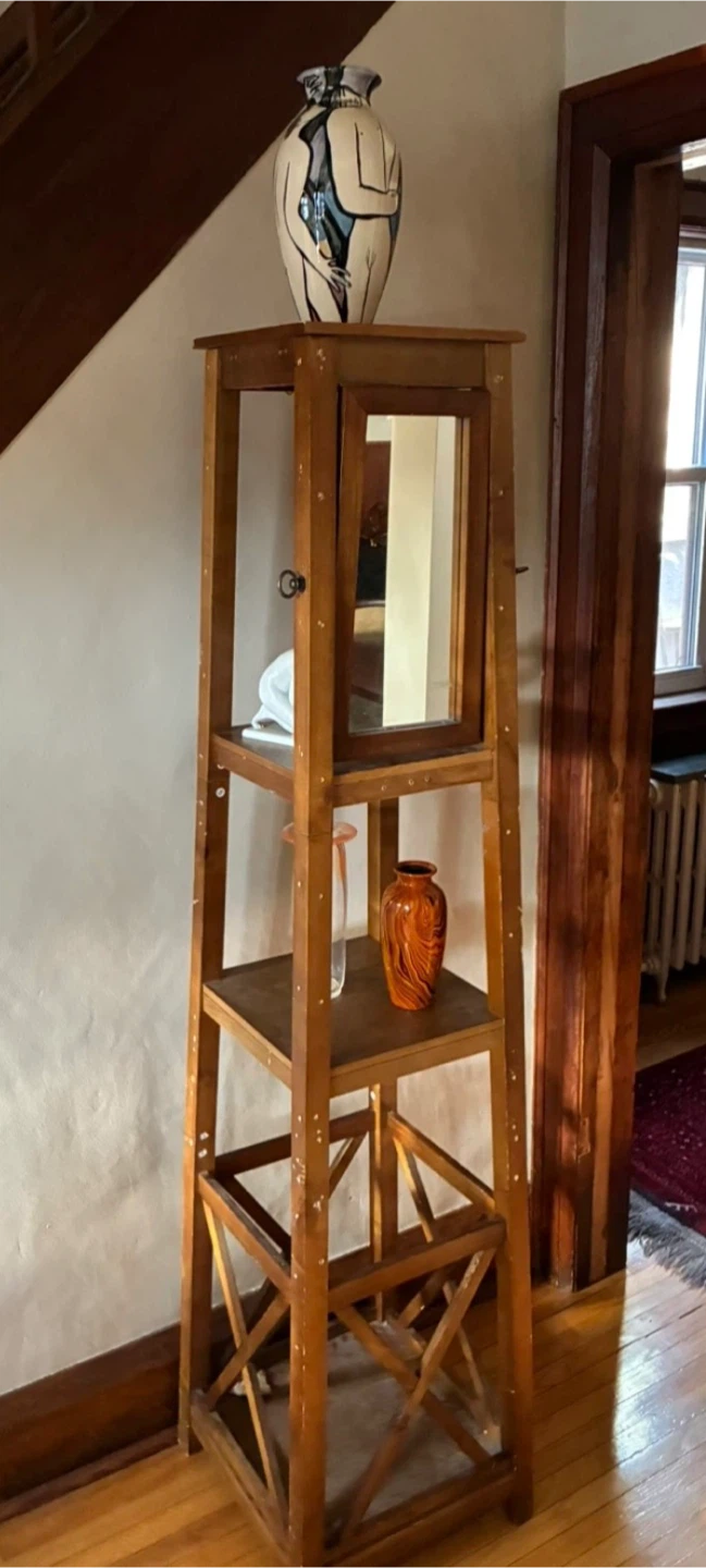 $36  TALL NARROW WOODEN DISPLAY TOWER WITH SWIVELLING MIRROR