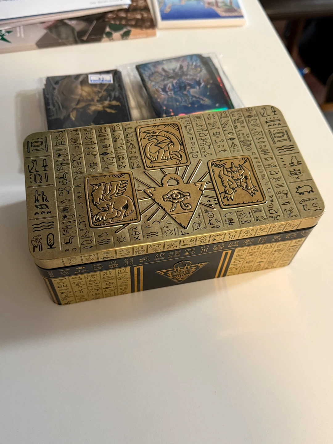 Yu-Gi-Oh! Egyptian God Metal Storage Tin and assorted cards.
