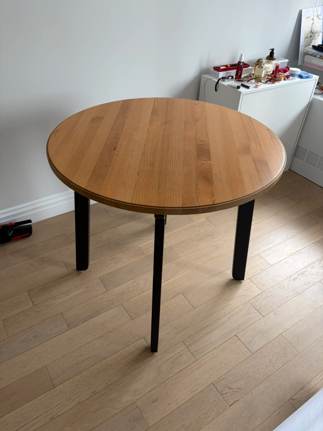 Round wooden dining table