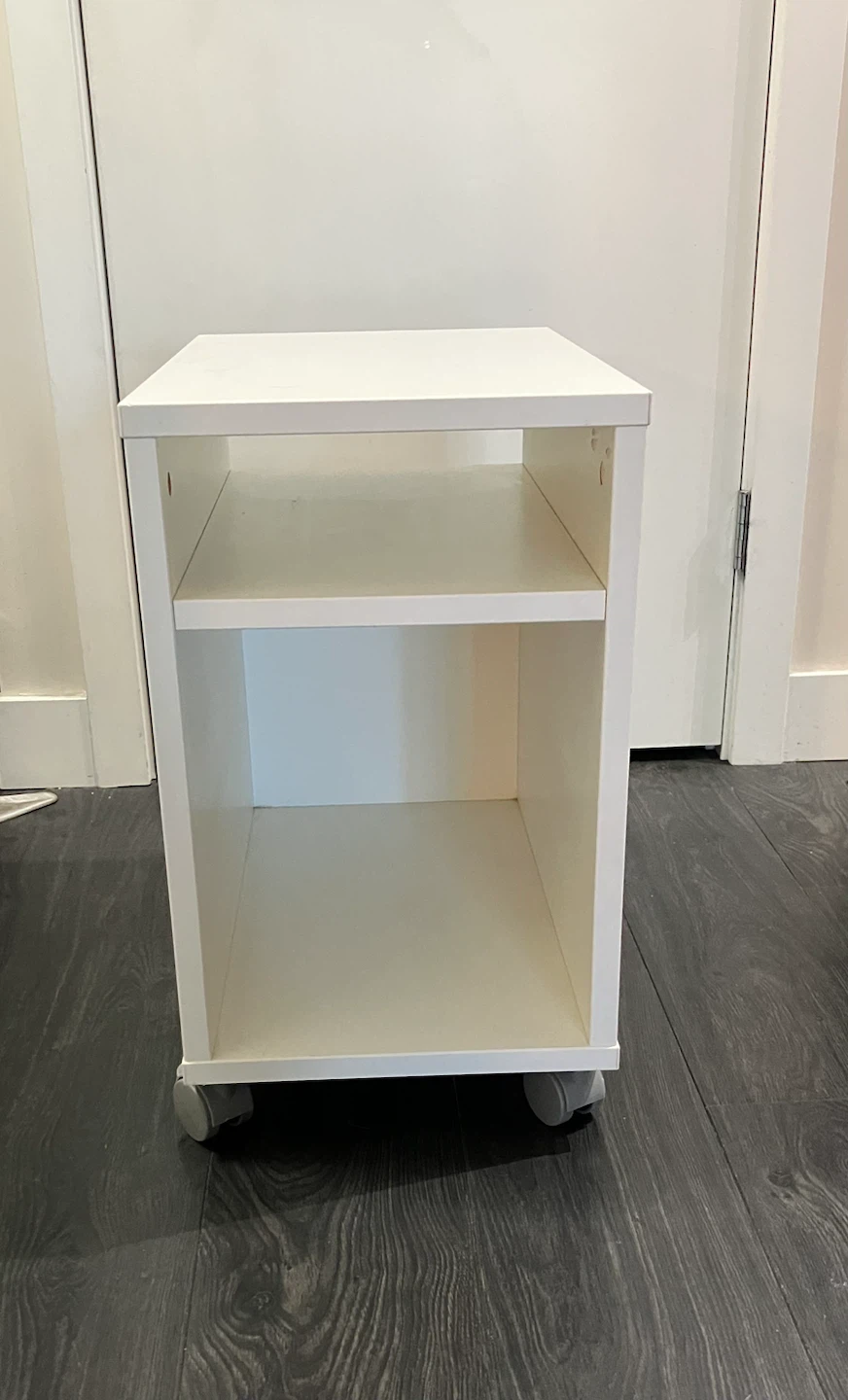 White mobile storage unit (nightstand/side table) with shelves