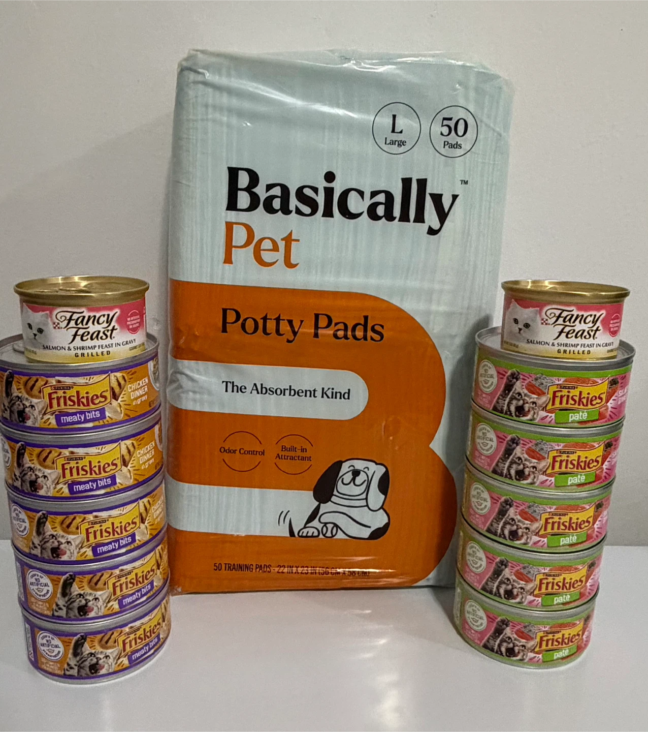 Basically Pet Potty Pads and Assorted Fancy Feast Friskies