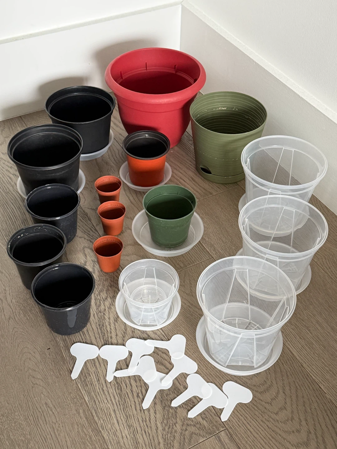 16 Assorted Plastic Plant Pots and 10 Labels