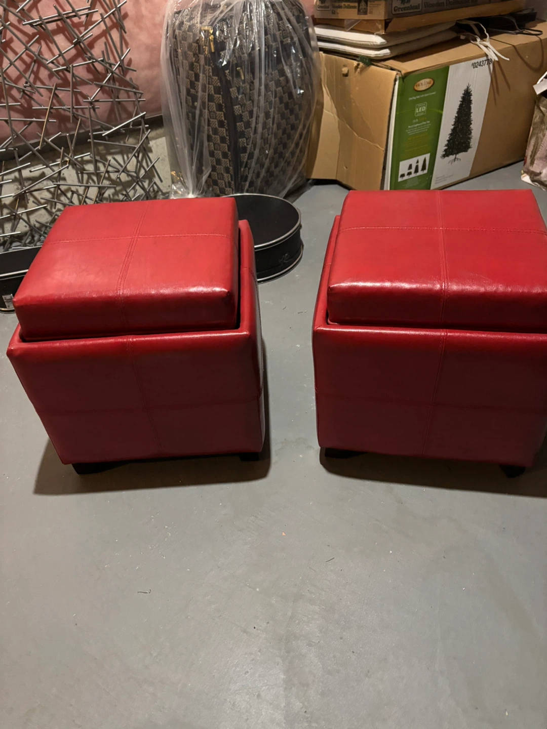 2 red storage ottoman