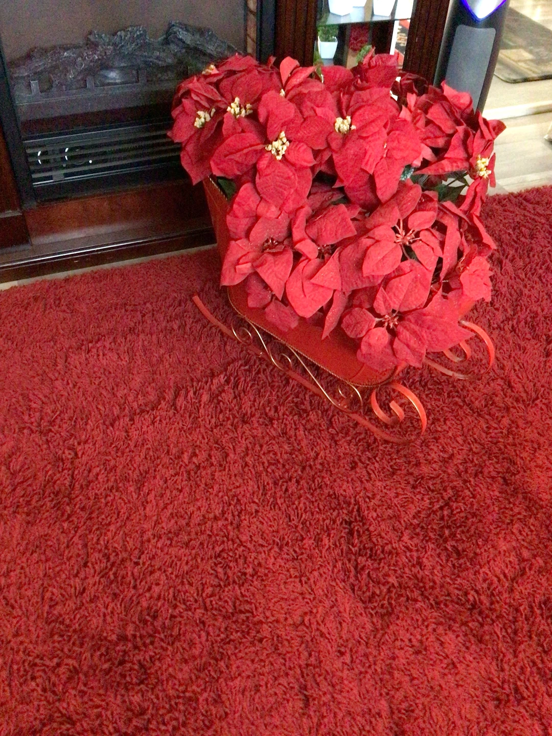 Decorative Christmas Sleigh with Artificial Poinsettias