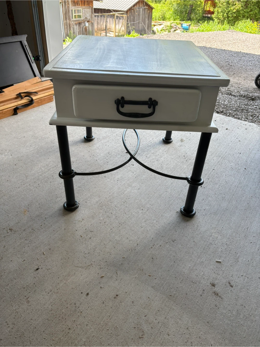 White side table with black metal legs