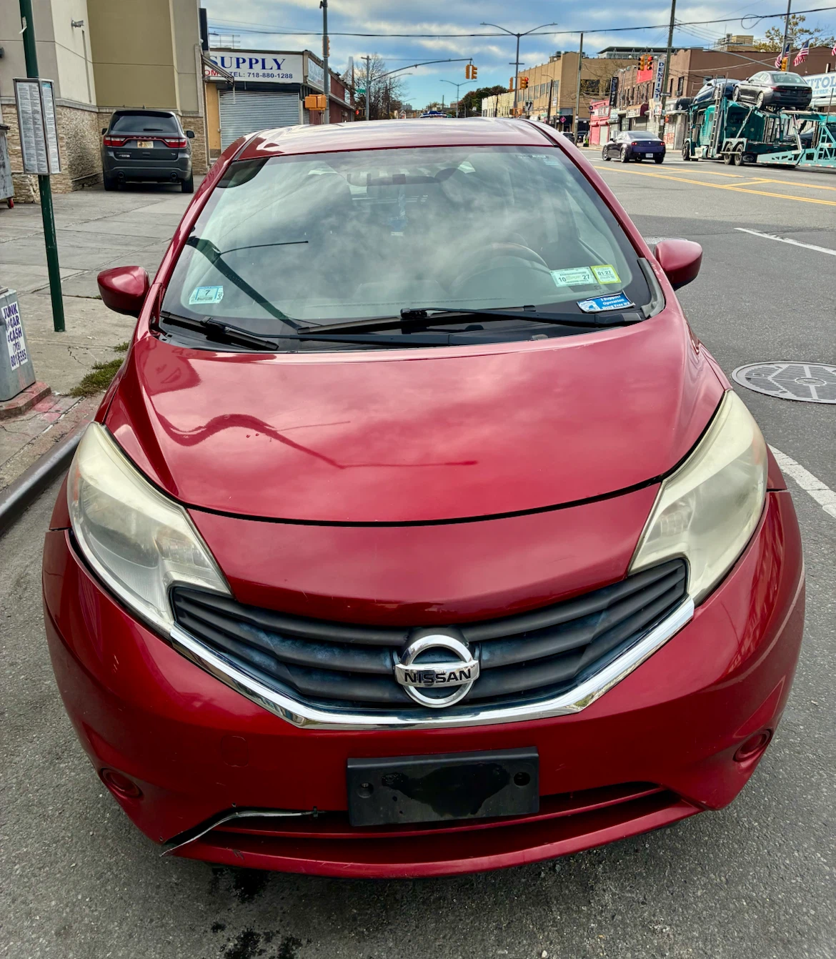 Red Nissan Versa Note