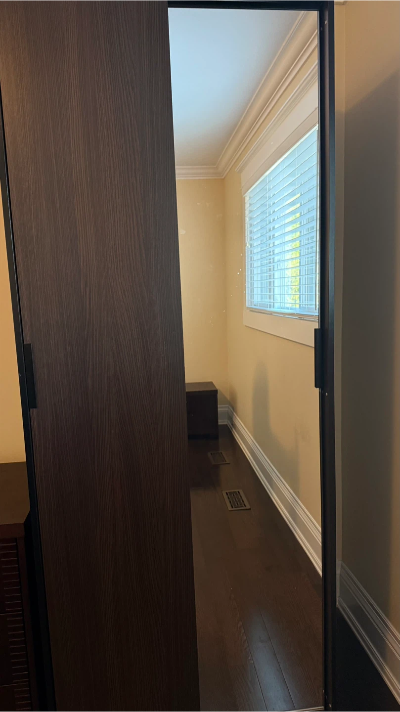 Dark wood grain wardrobe with sliding door