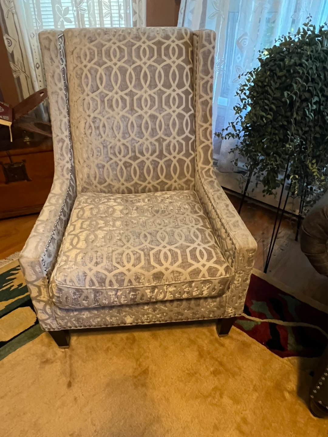 Tufted Sofa and Patterned Accent Chair
