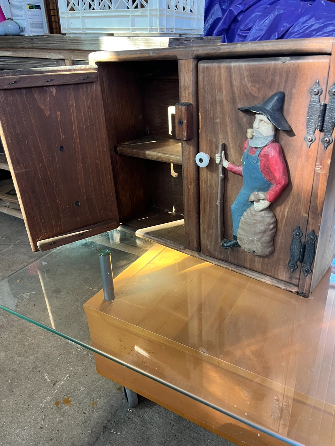 Rustic Wood Wall Cabinet with Carved Figures