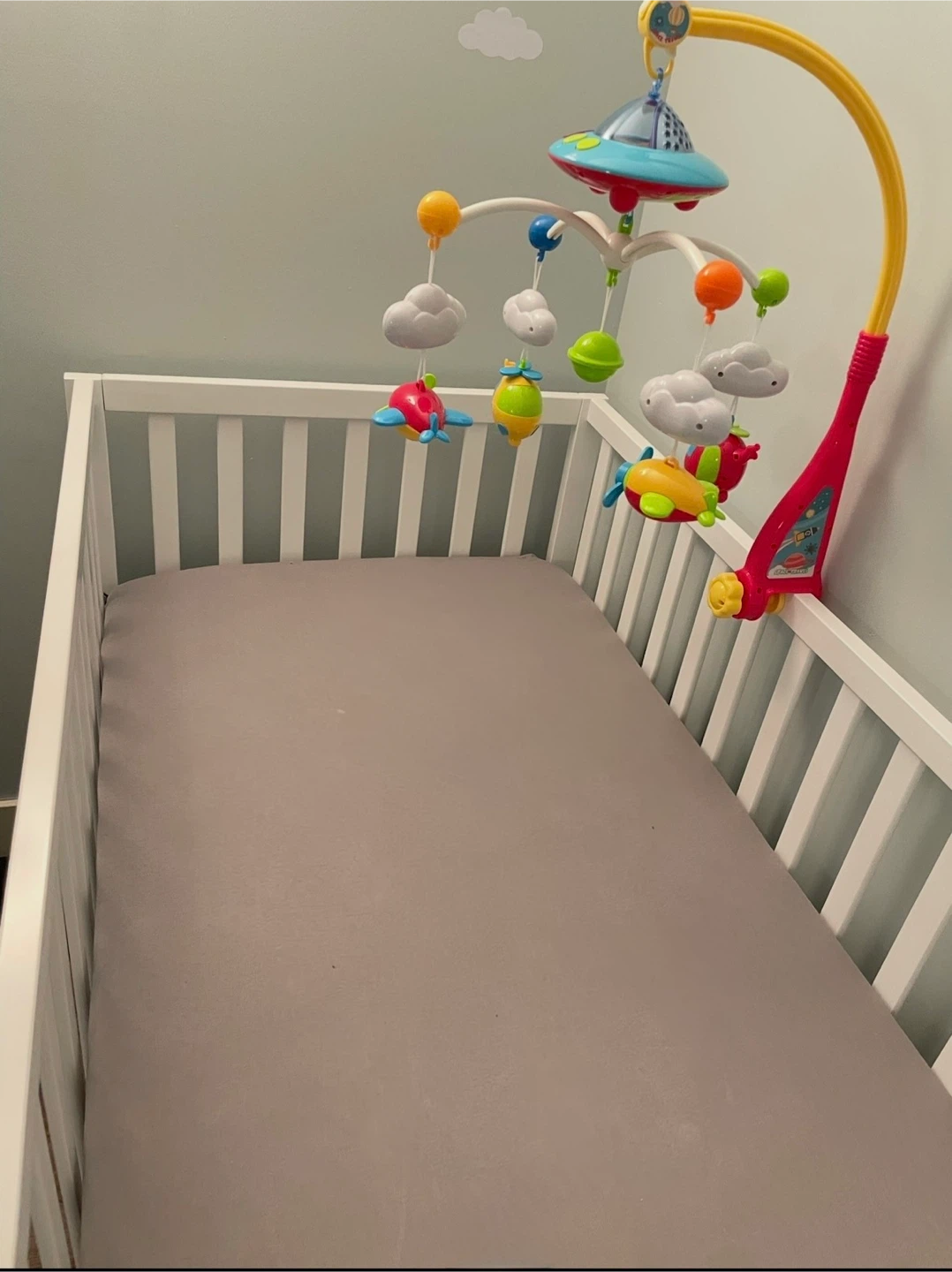 Baby crib mobile with space and airplane design
