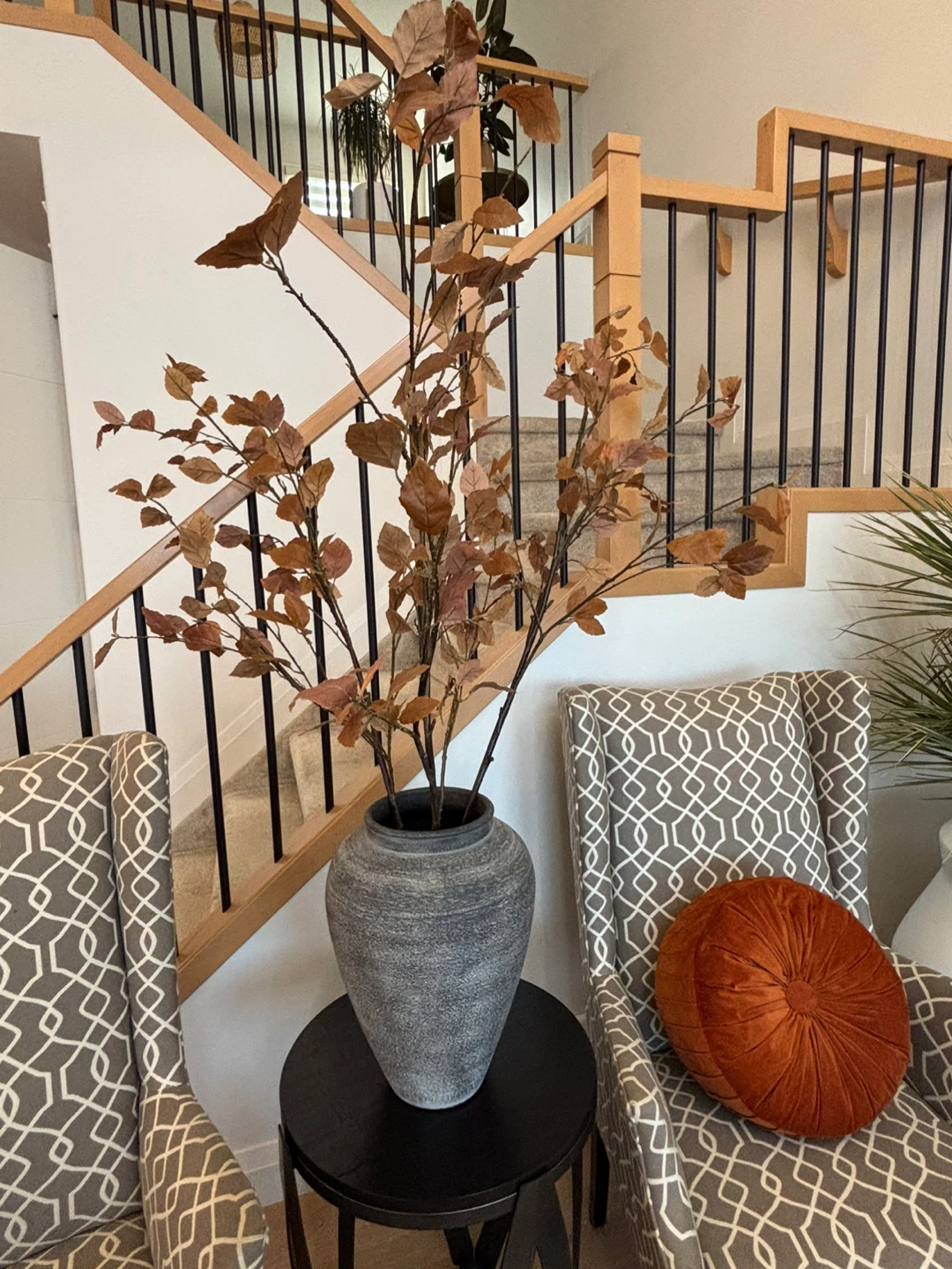 Rustic grey textured floor vase with faux autumn branches