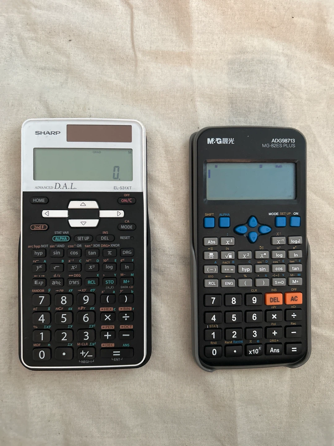 Sharp EL-531XT and M&G MG-82ES PLUS Scientific Calculators