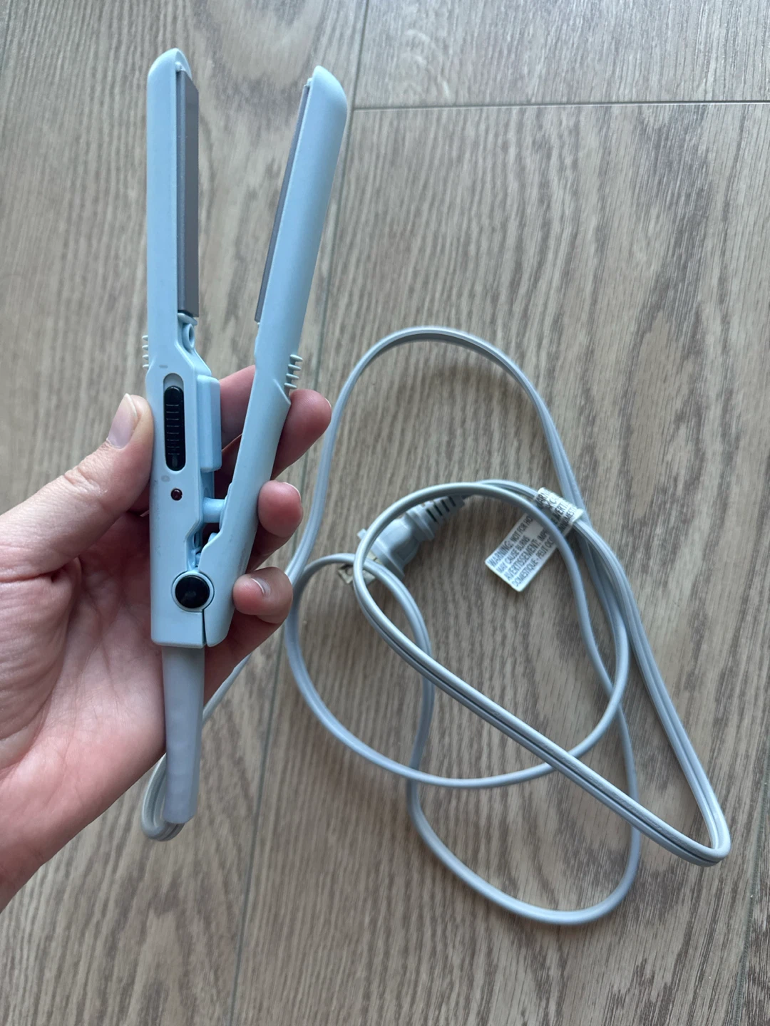 Light blue compact hair straightener