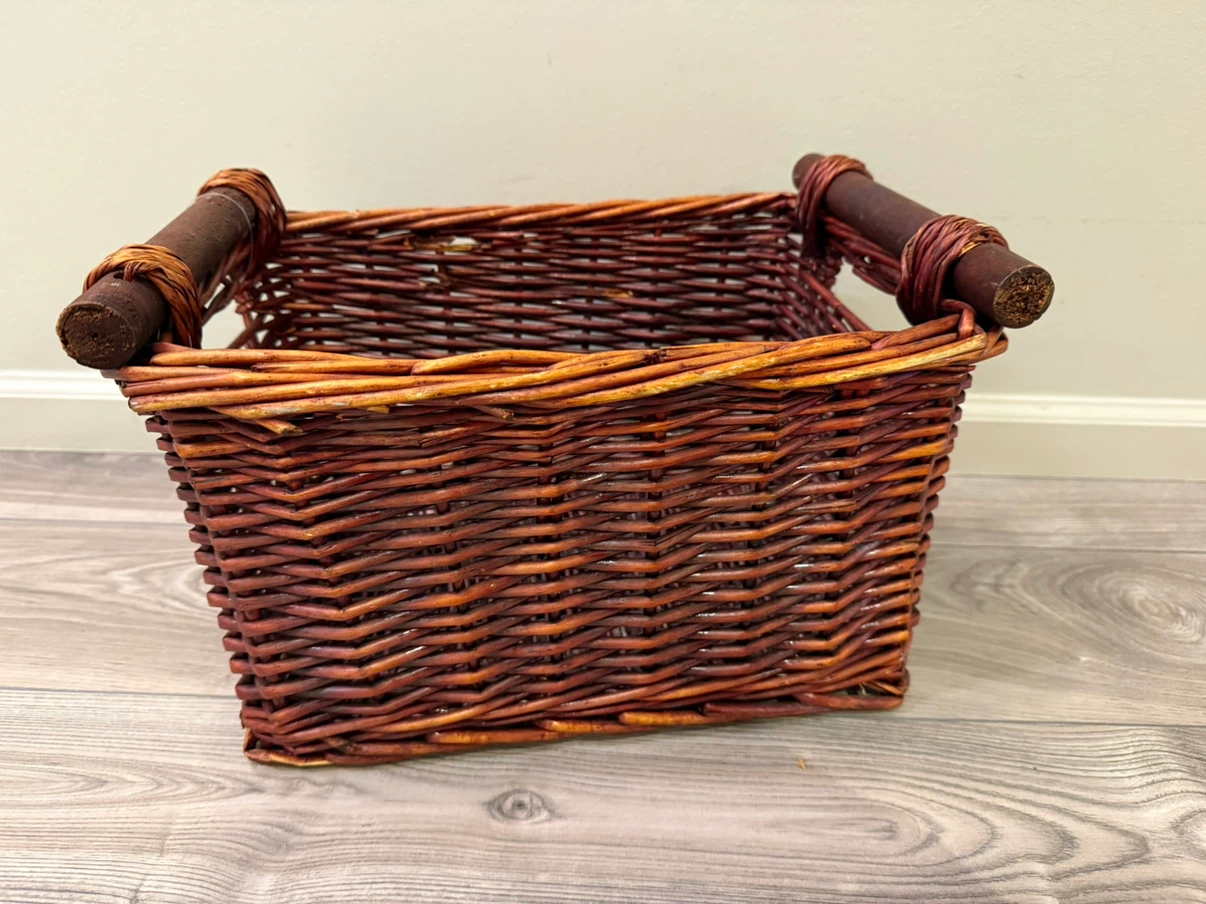 Wicker storage basket with wood handles
