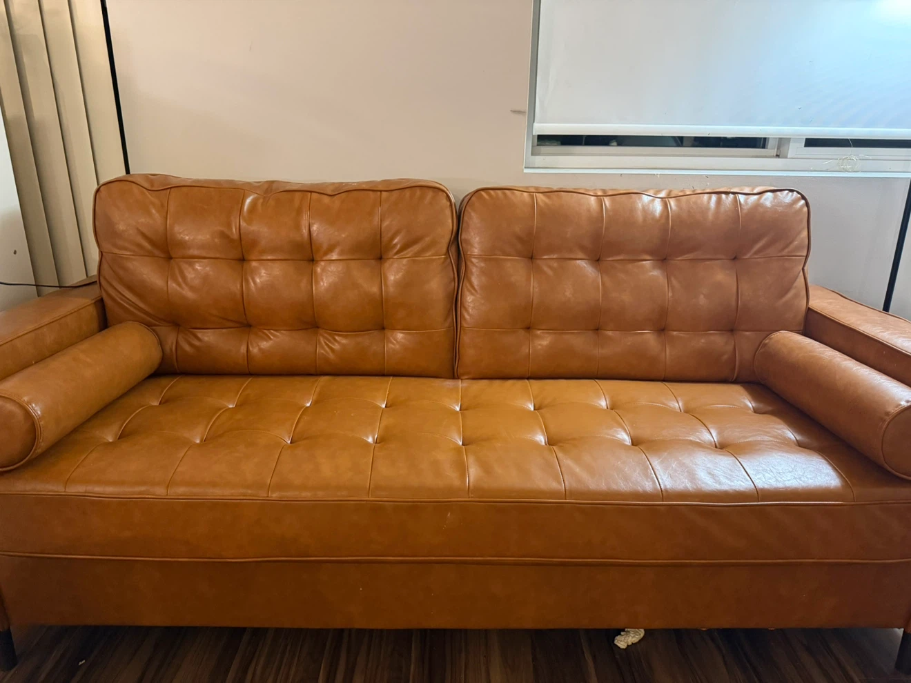 Tan Faux Leather Sofa and Black Side Table
