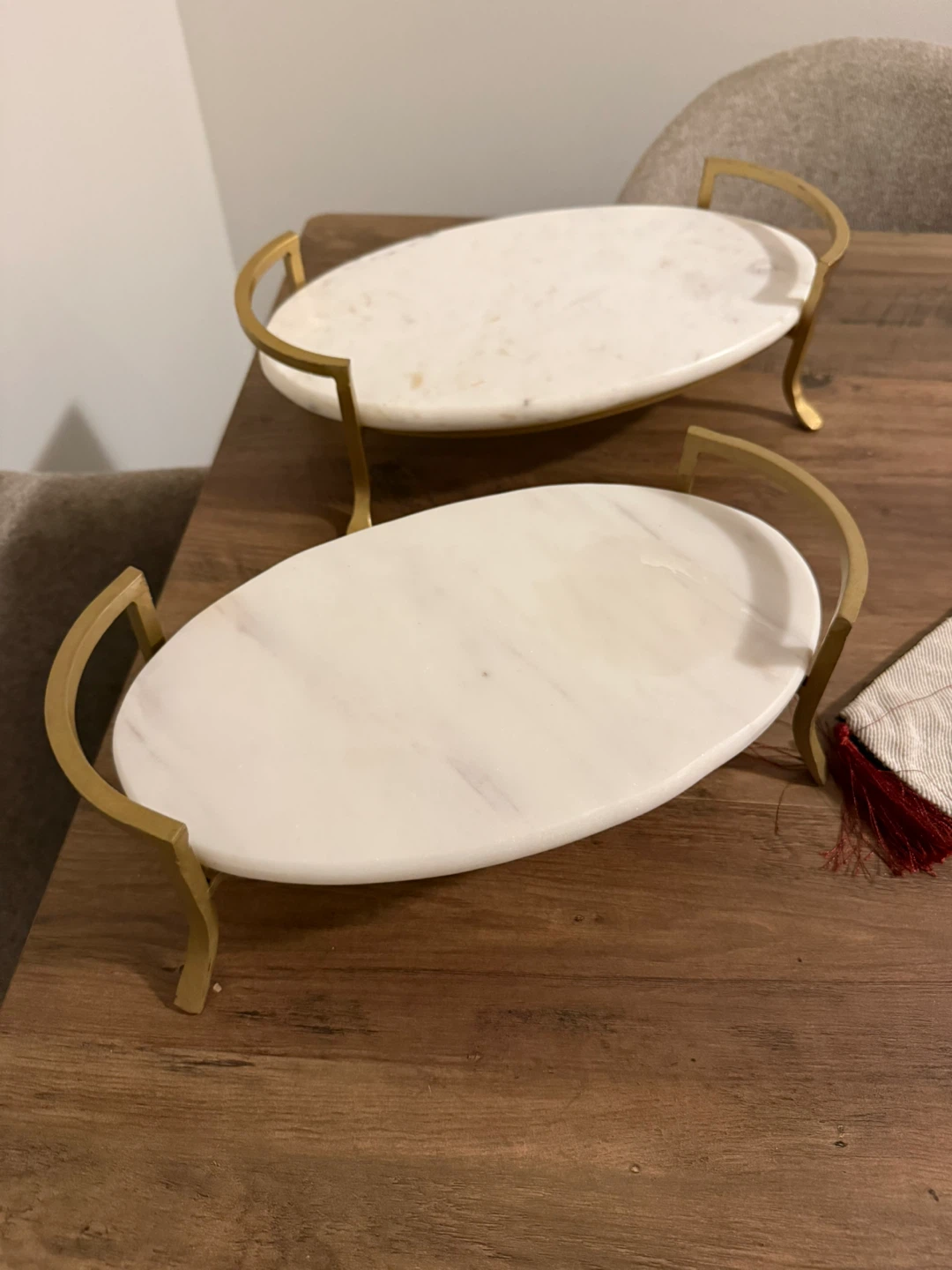 Two Oval White Marble Serving Trays with Gold Handles