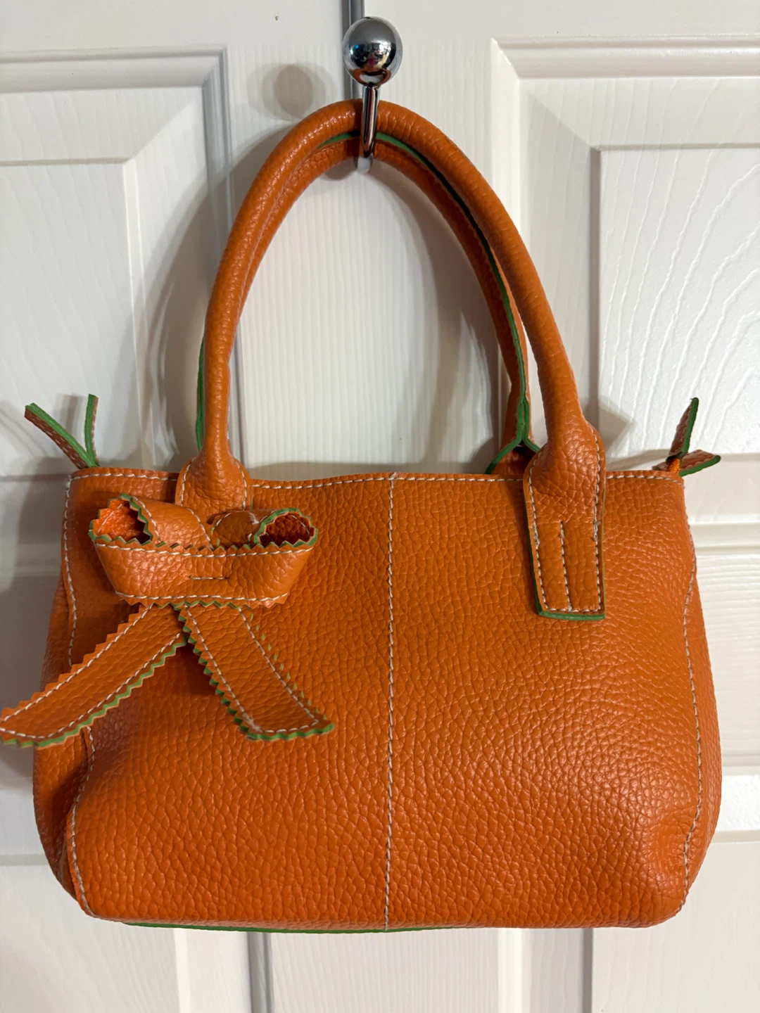 Mellow World Orange Handbag with Bow Detail