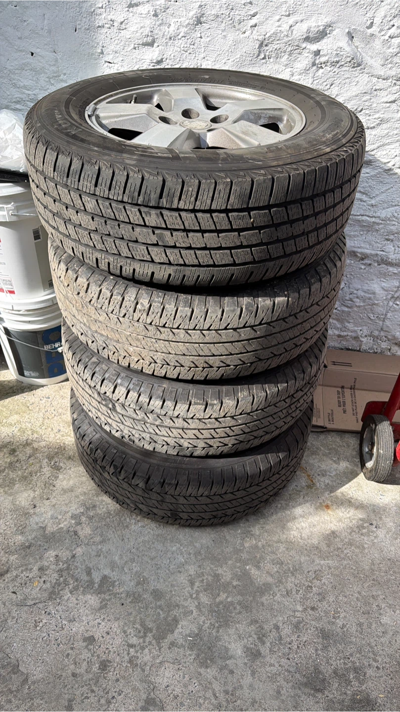 Set of 4 Cooper Evolution HT2 Tires with Rims