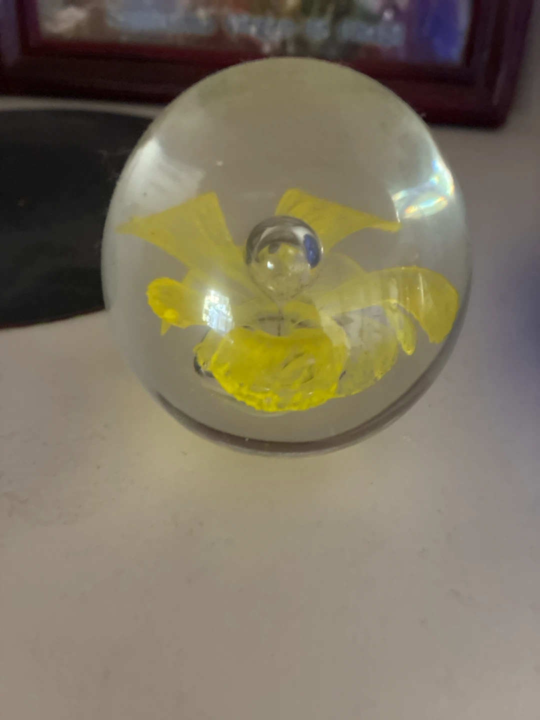 Clear Glass Paperweight with Yellow Flower