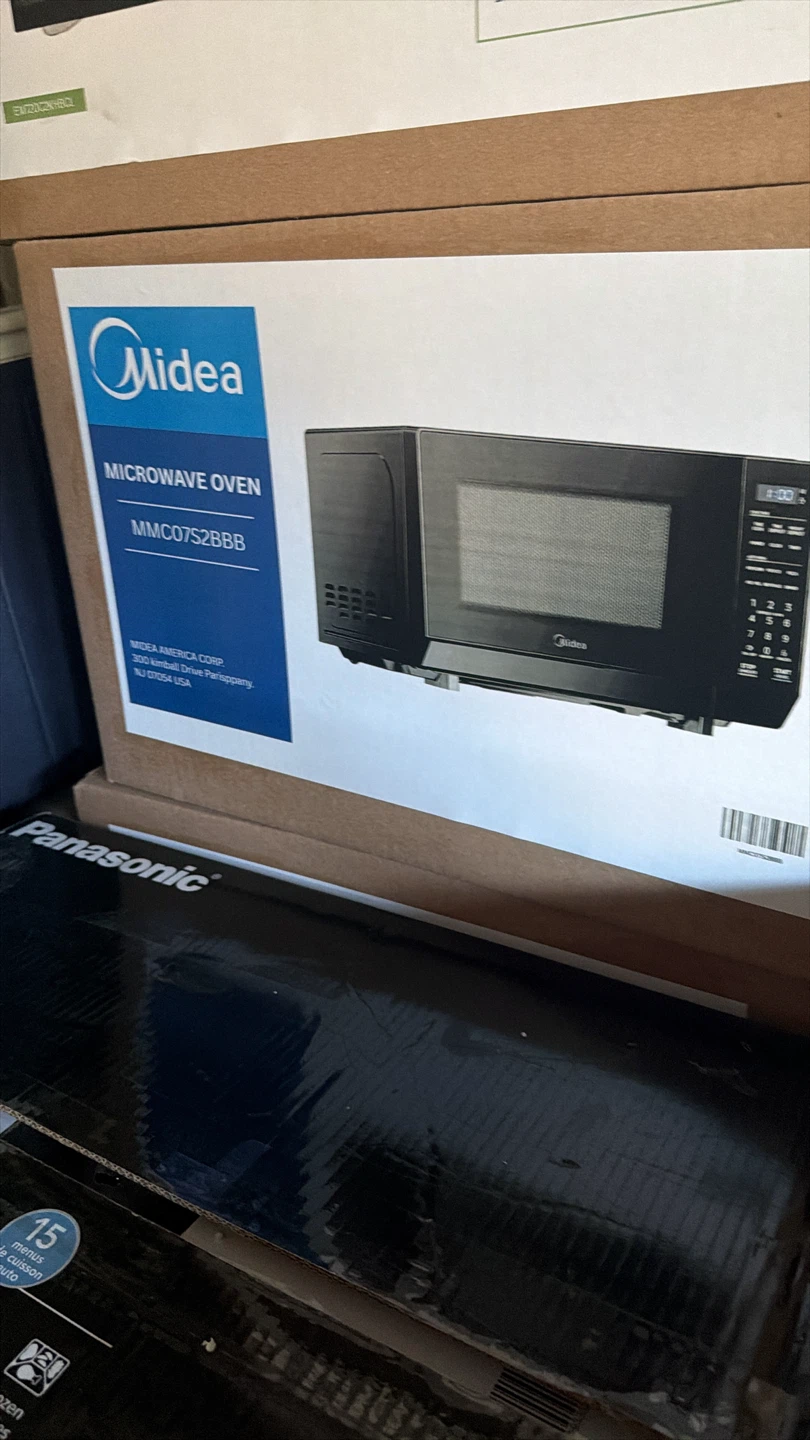 60$ Midea MMC07S2BBB Microwave Oven
