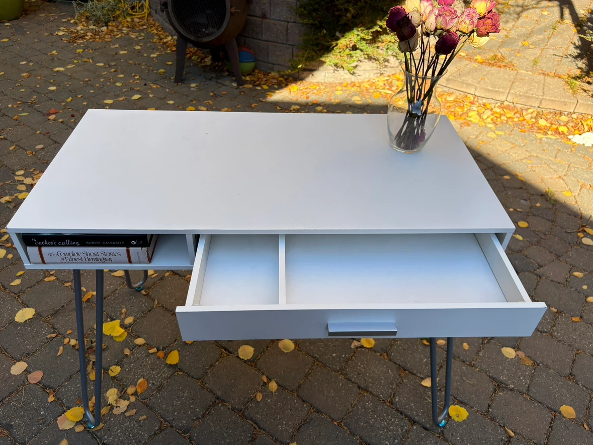 White desk with drawer and open storage