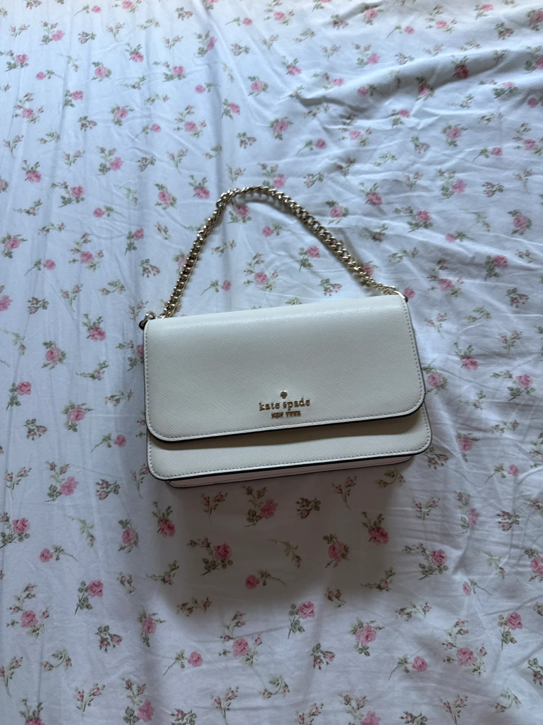 Kate Spade New York cream crossbody bag