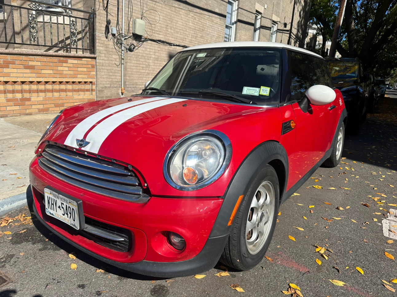 Red Mini Cooper 2013 with White Stripes