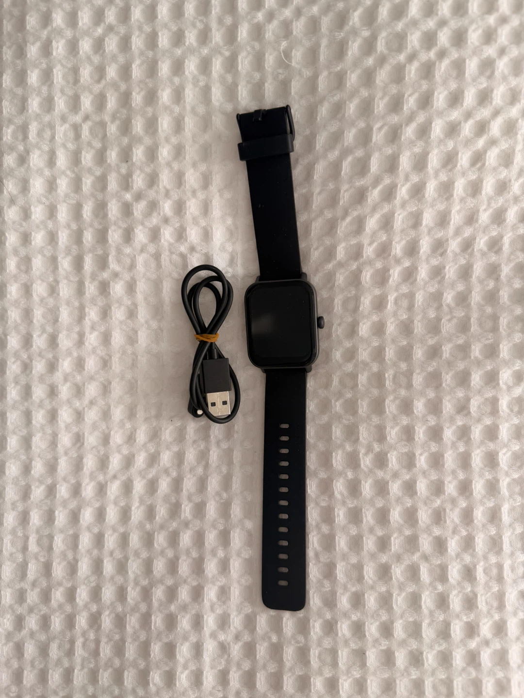 Black Smartwatch with Charging Cable