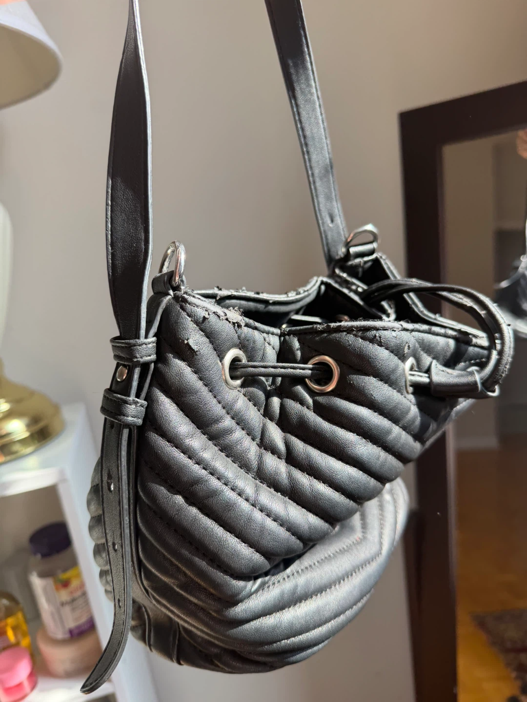 Black quilted bucket bag