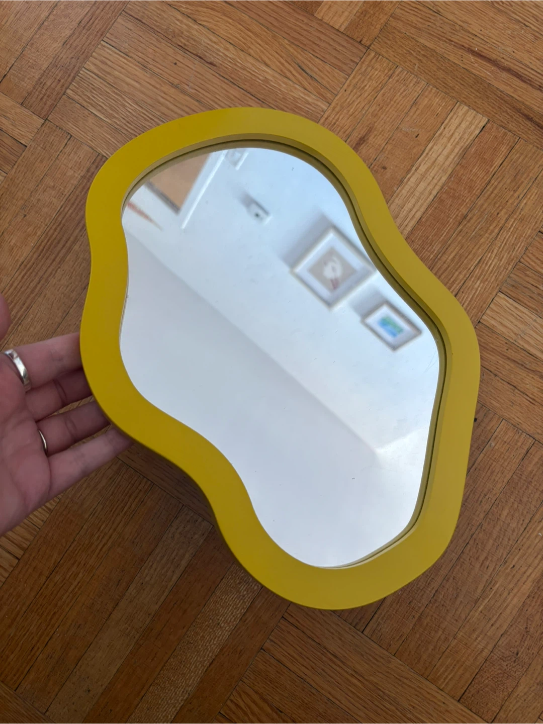 Yellow wavy irregular shaped wall mirror