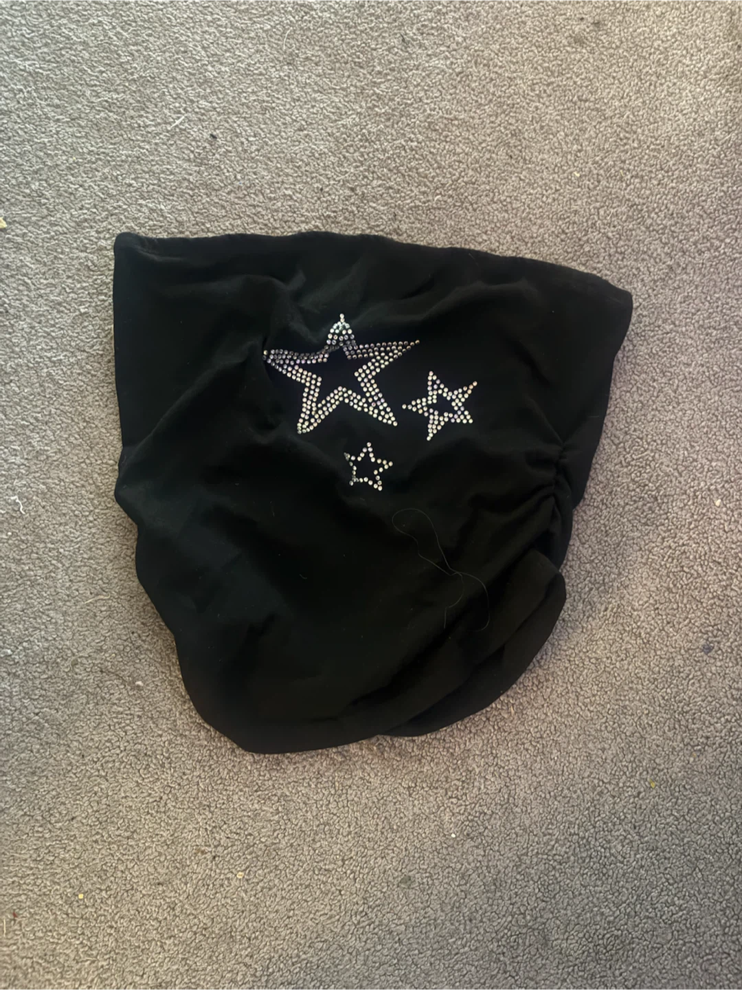 Black tube top with rhinestone star detail