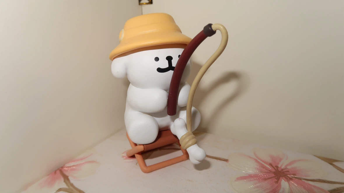 Fishing Dog Character Figurine