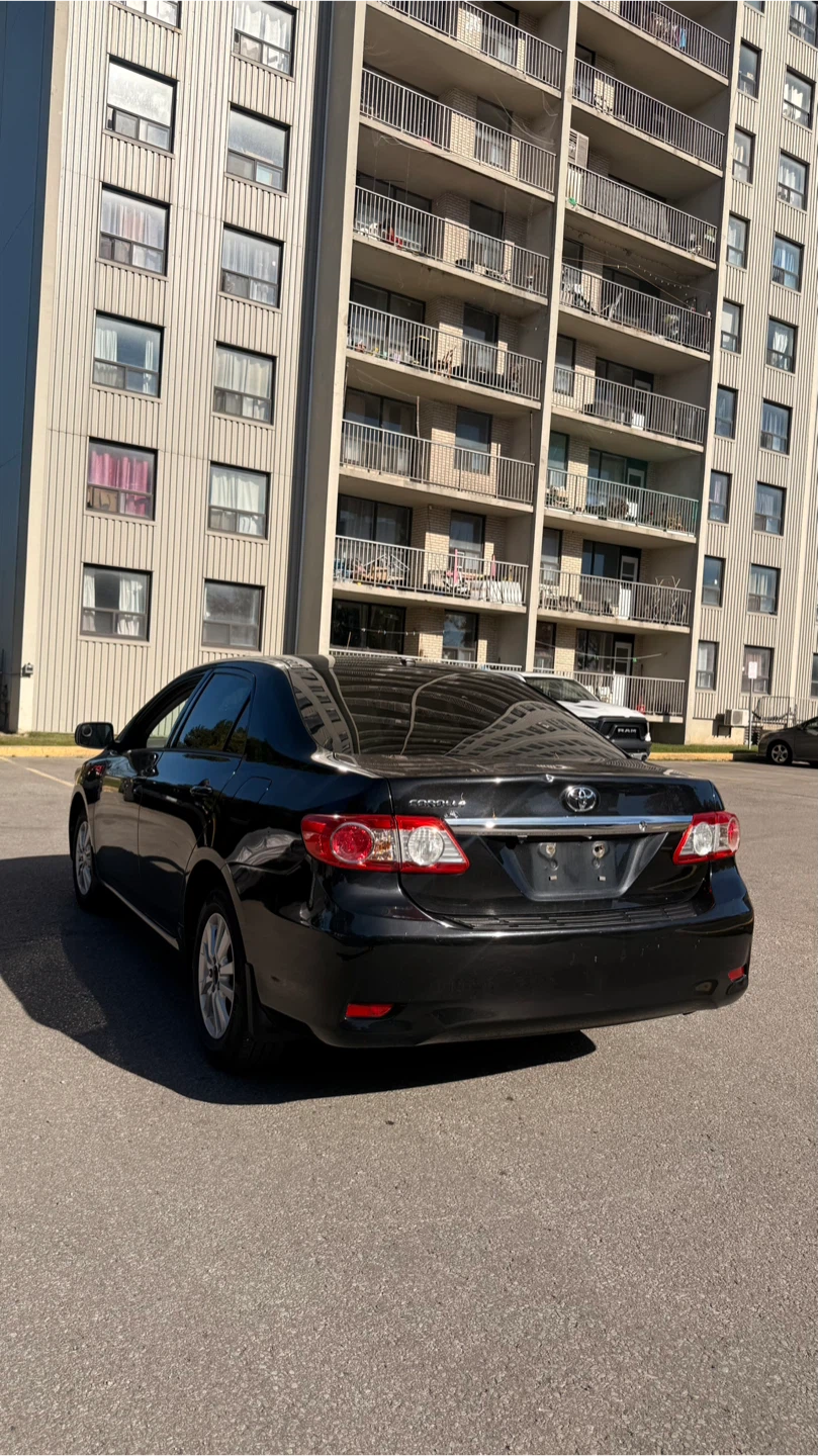 2013 Toyota Corolla 5 speed Manual with Safety - photo 3