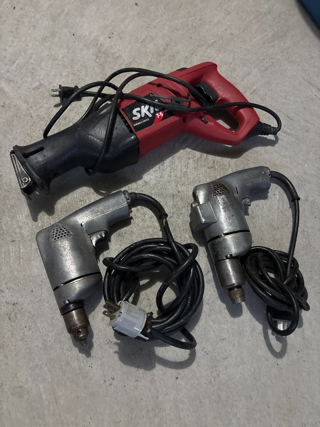 Skil Reciprocating Saw and Two Electric Drills