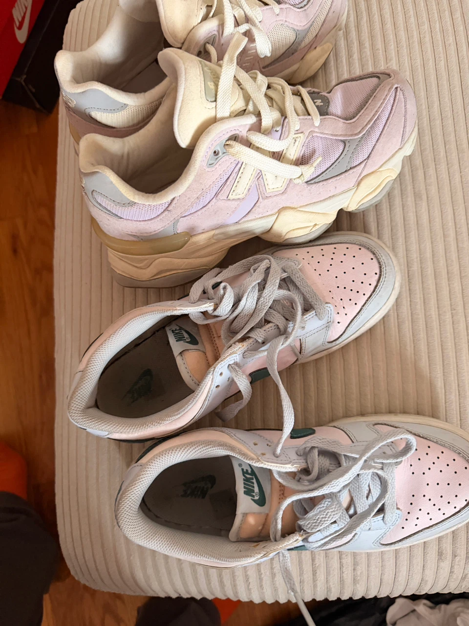 Two pairs of pink sneakers