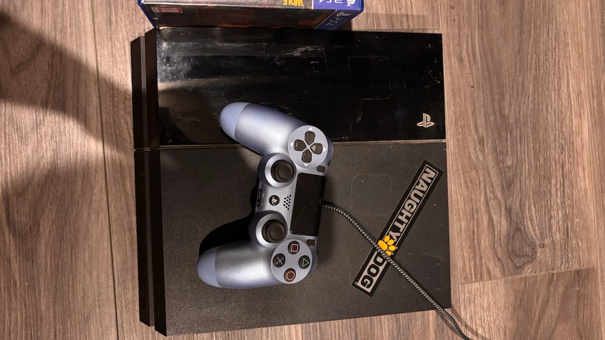 PlayStation 4 Console 10.5 firmware with 7 games and controller - photo 3
