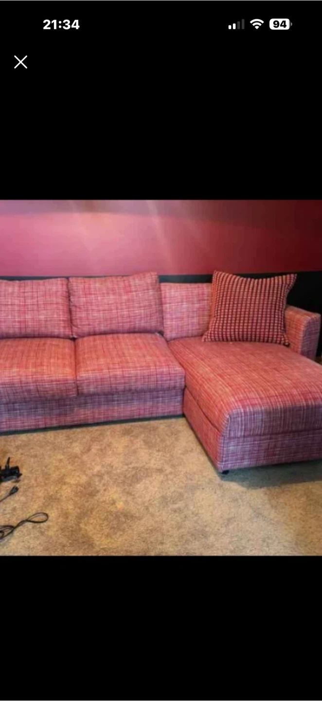 Red patterned sectional sofa