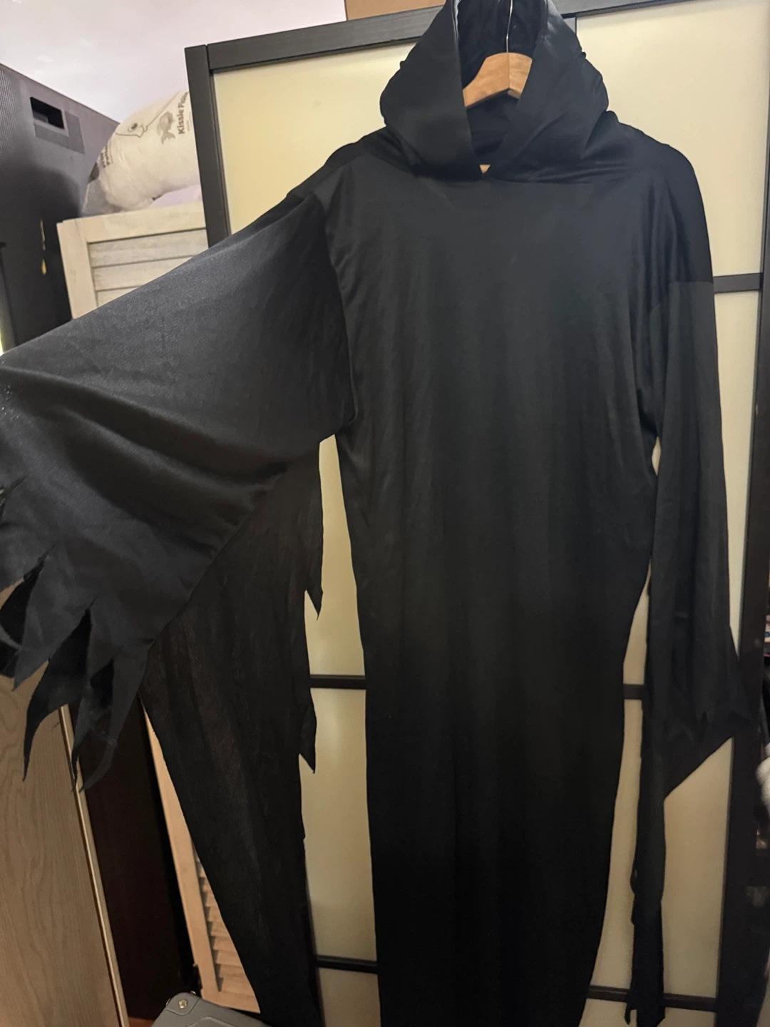 Black Hooded Robe Costume Costume includes a mask.