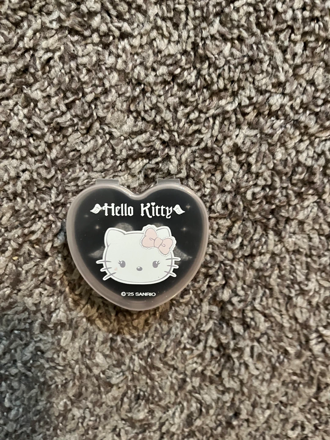 Hello Kitty heart-shaped case