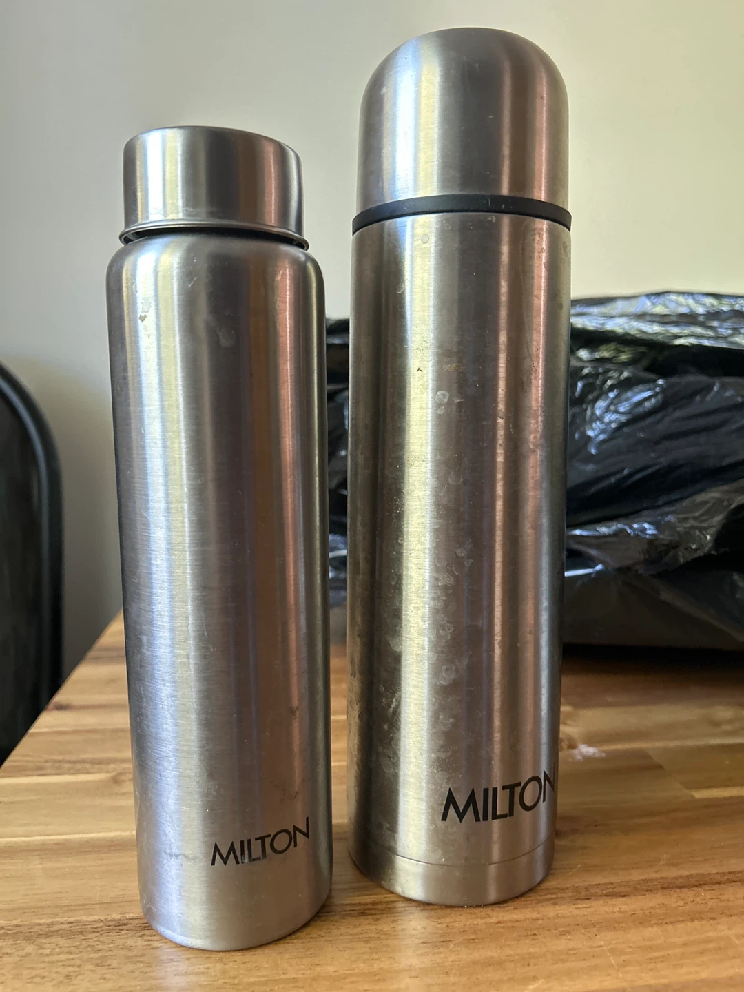 Two Milton Stainless Steel Vacuum Insulated Flasks